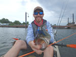 Matthew Randall's holding Bass #3.