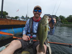 Matthew Randall's holding Bass #4.