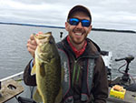 Matthew Randall holding a G-bay largemouth